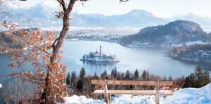 Lake Bled with wooden bench in winter, Slovenia